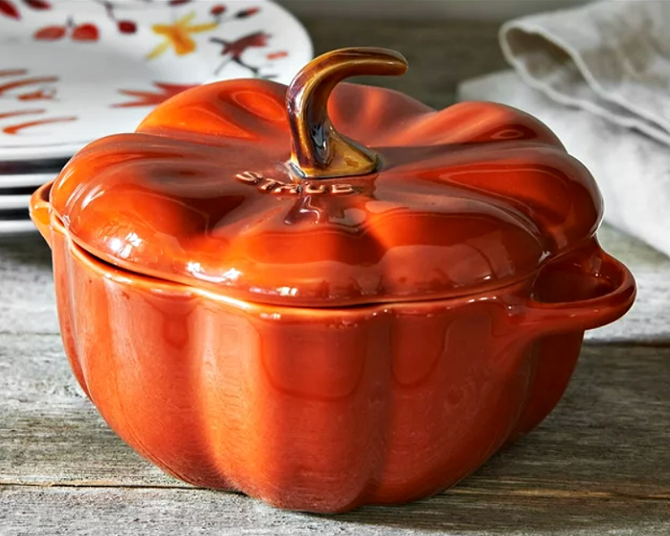 An orange pumpkin cast iron pot.