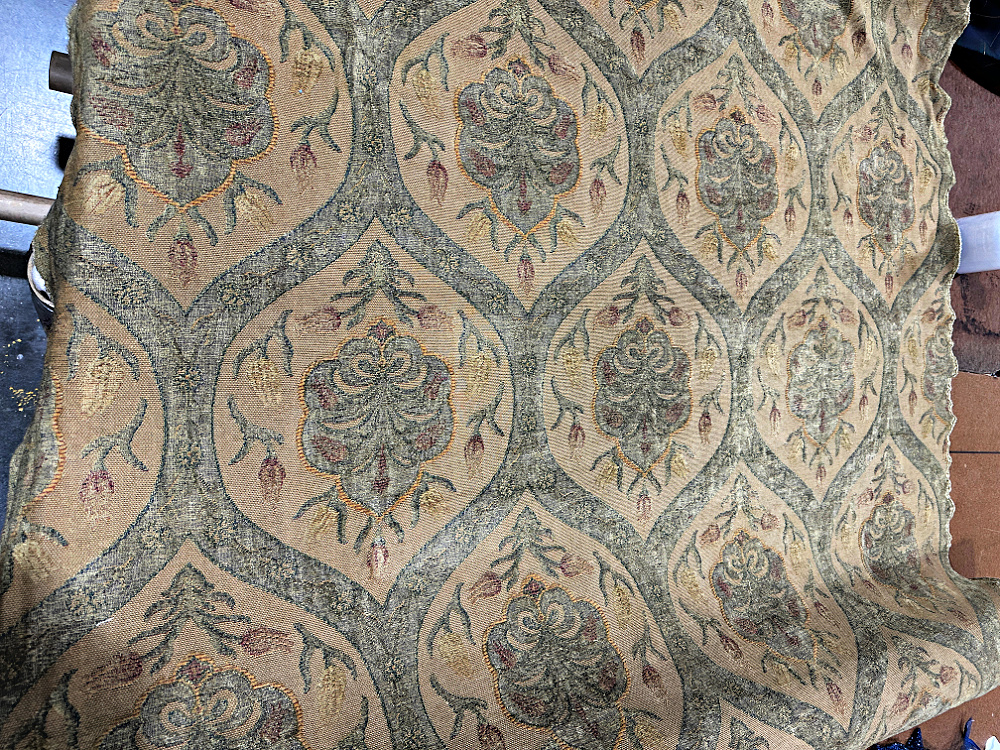 Detail of the patterned upholstery fabric chosen for the chair’s newest makeover.
